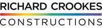 Logo for Richard Crookes Constructions. The words are stacked, separated by a thin horizontal line with a rainbow gradient.